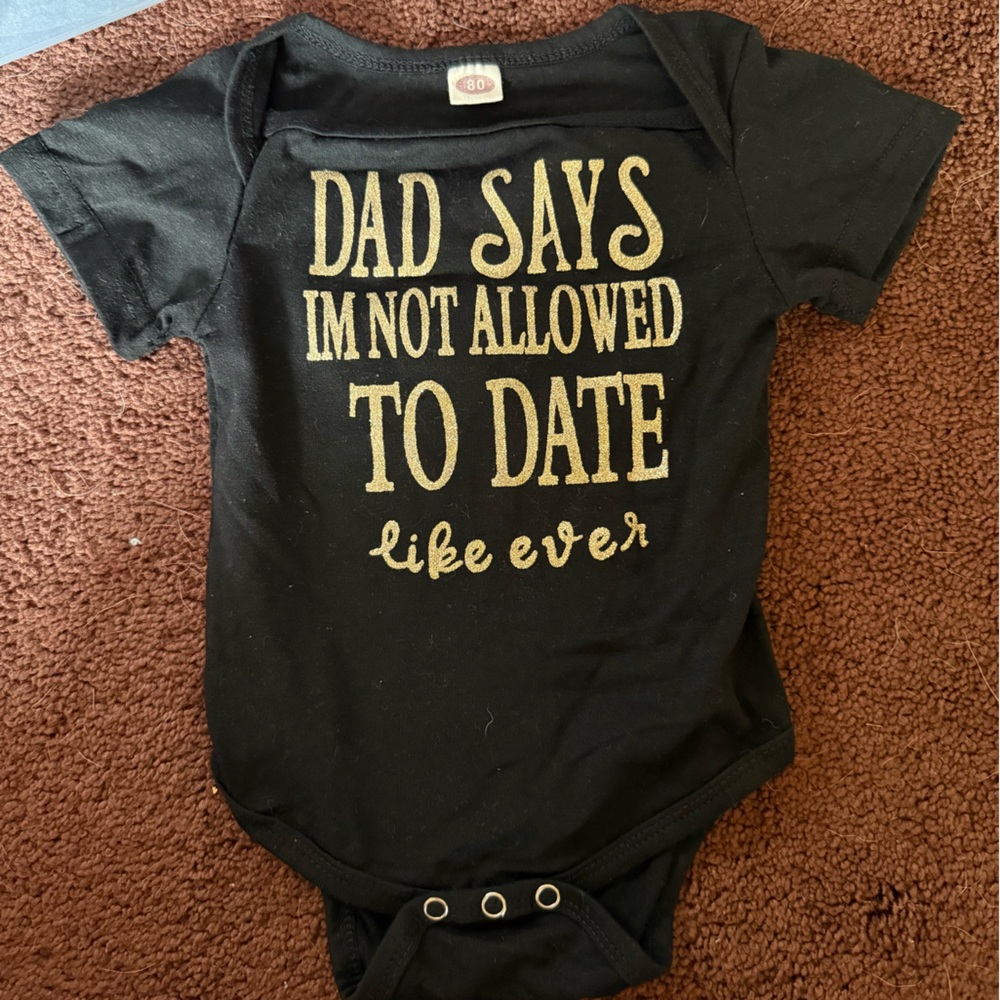 Black Baby Onesie with Gold Text